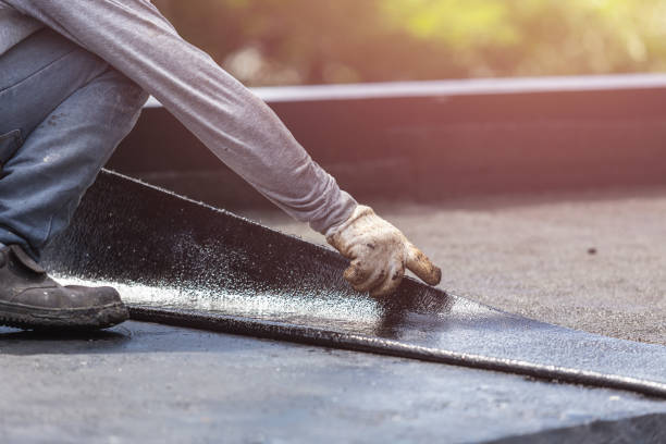 Professional Waterproofing technician working in Newport, OR